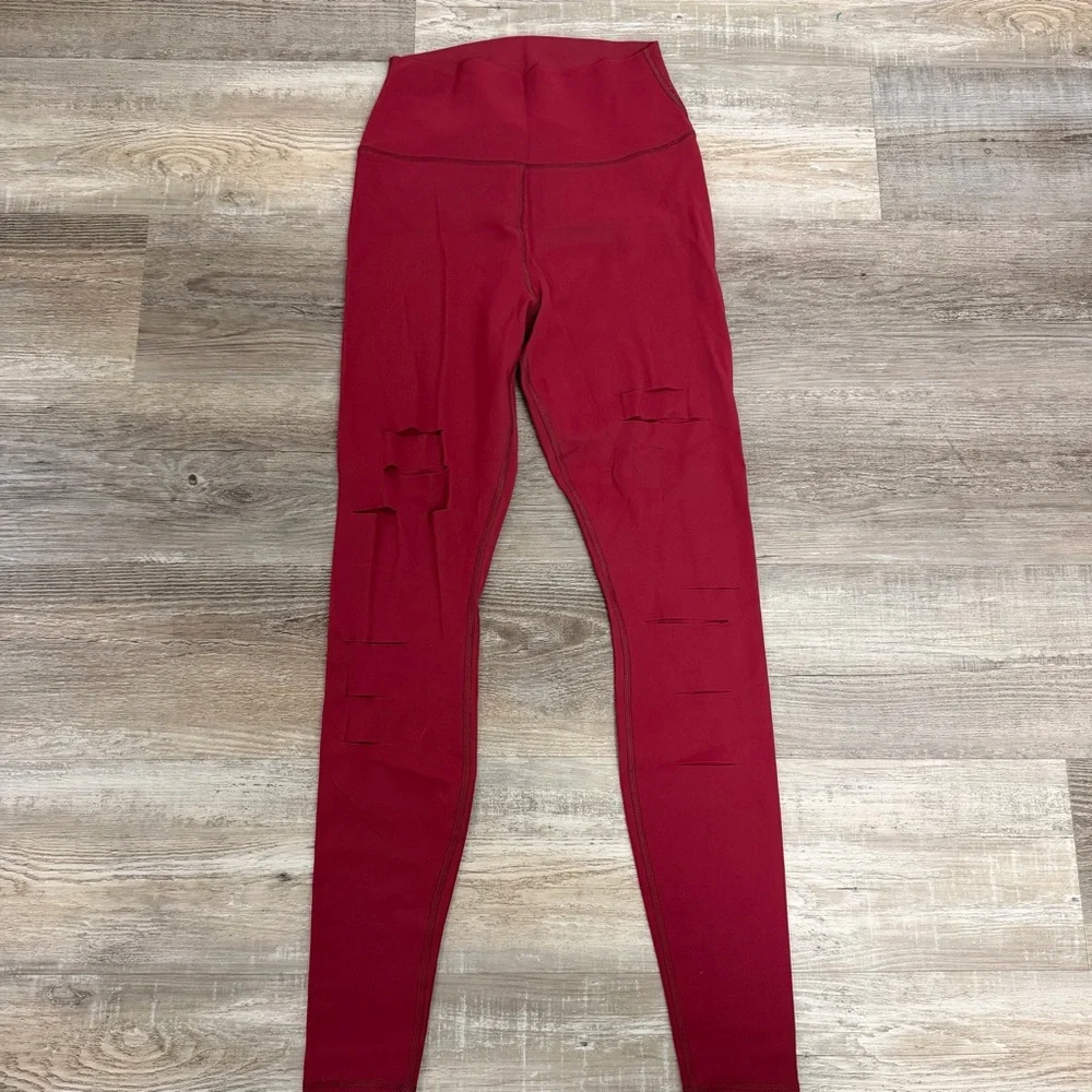 Alo Yoga High Waisted Ripped Warrior Leggings in Red-size Medium *NEW w/o tags*